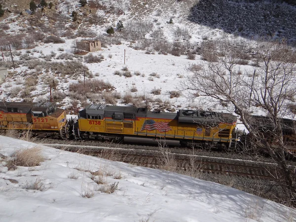 Freight train in narrow canyon