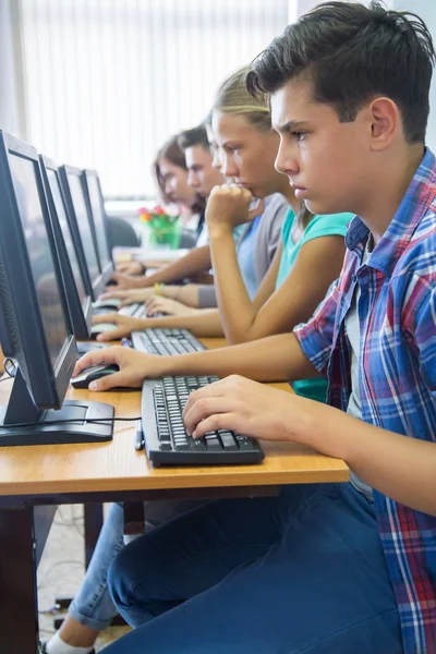 Students at computers in classroom