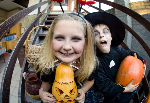 Children curve faces in fairy costume