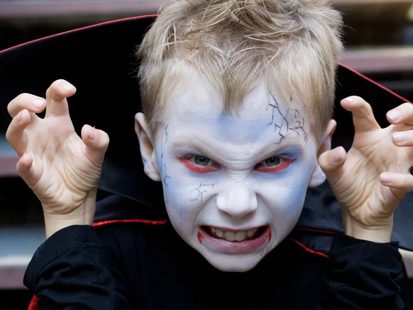 Little boy curve faces in fairy costume