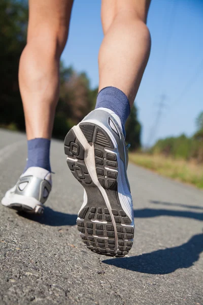 Male feet in sneakers