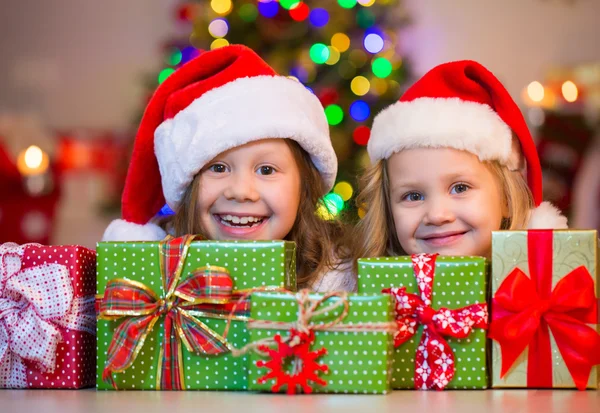 Little girls in Santa hats