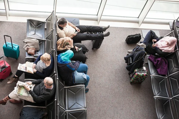 Passengers in the airport waiting room