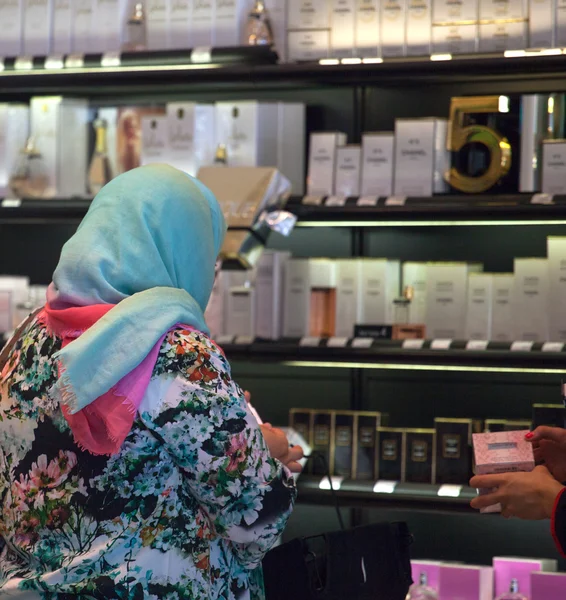 Two muslim woman in the perfumes shop