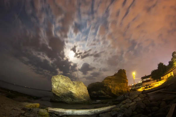 Fisheye - Night seascape with the moon and moving clouds
