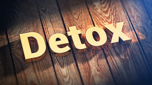 Word Detox on wood planks