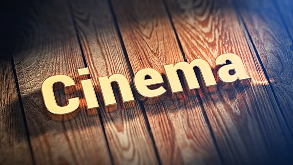 Word Cinema on wood planks