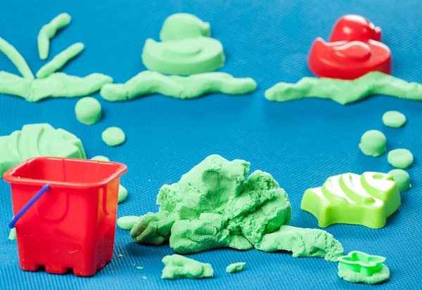 Modern toy - a kinetic sand molds for the game