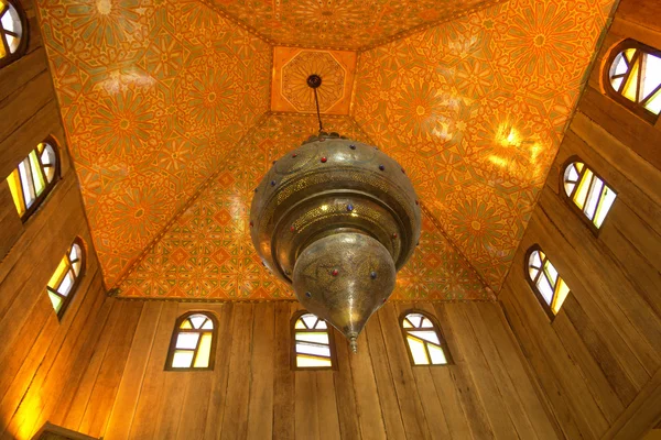 Detail of an old candle in a hotel in morocco