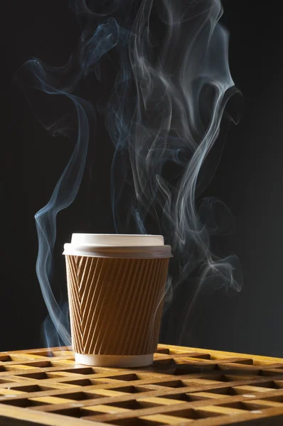 Diisposable coffee cup with smoke