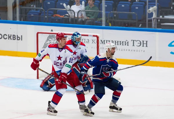 A. Koznev (9) and V. Brezgunov (15) in action