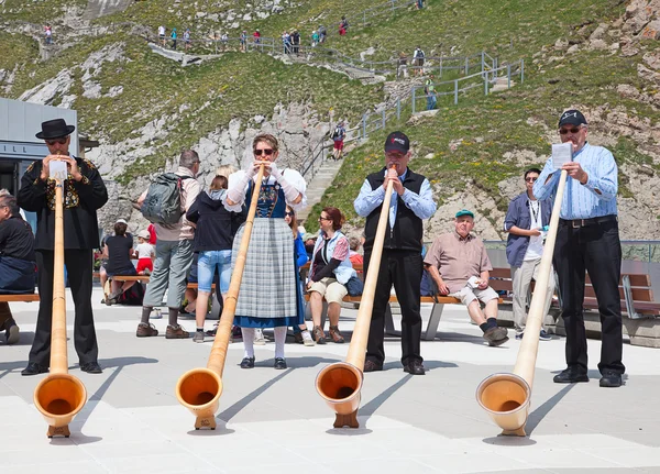 Swiss flag thrower on top of Pilatus