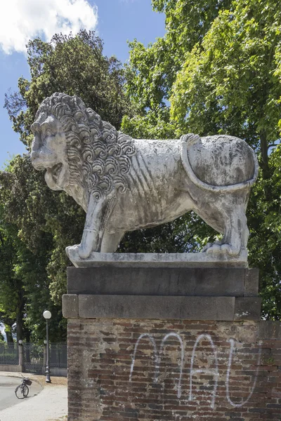 Lucca, town wall with lion statue, Tuscany, Italy