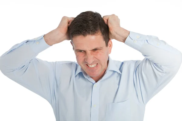 Angry Young Businessman Pulling his Hair