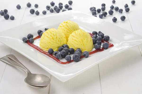 Lemon ice cream and blueberries