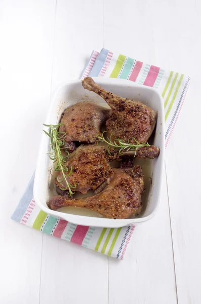 Oven baked duck legs with rosemary
