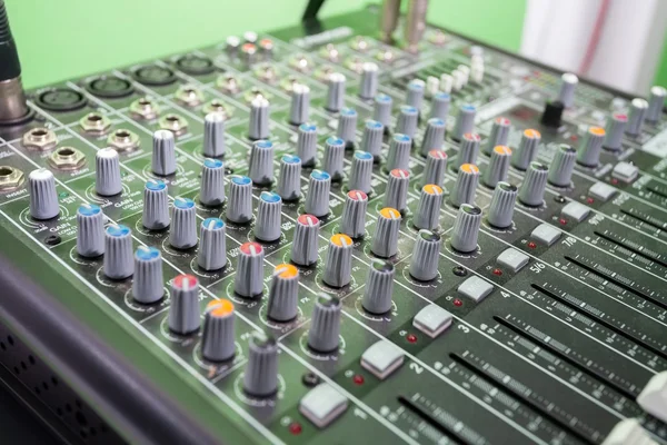 Multi Colored Music Mixer In Recording Studio