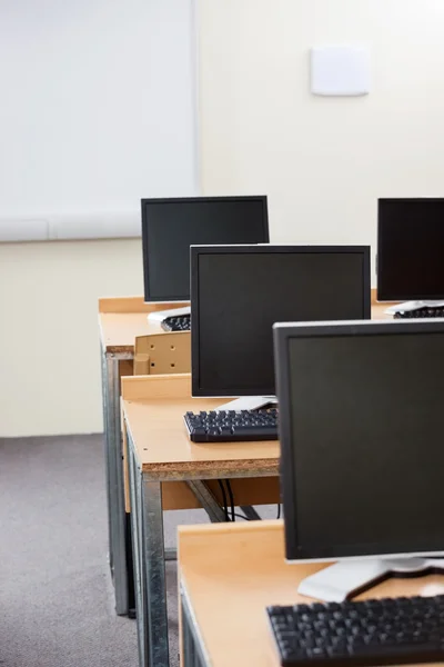 Computer Monitors With Blank Screens In Classroom