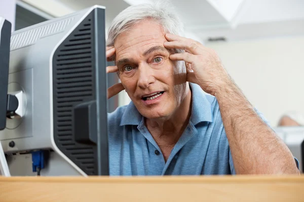 Stressed Senior Man During Computer Class