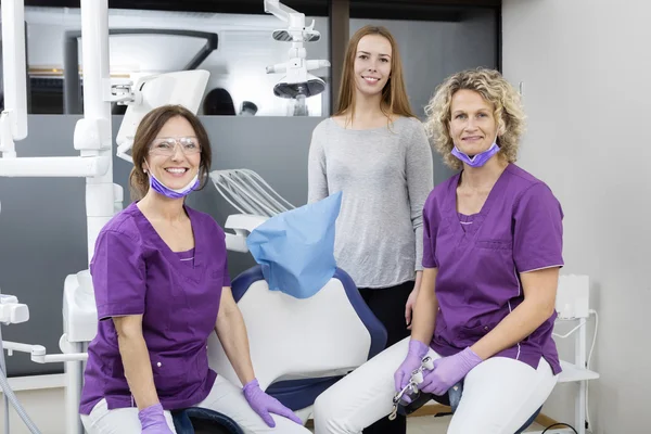 Female dentists with young patient