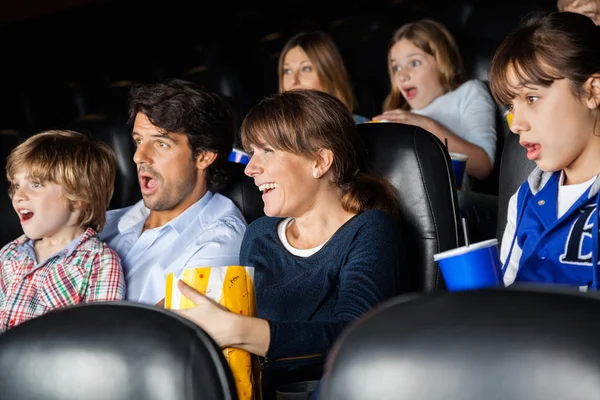Amazed Families Watching Movie