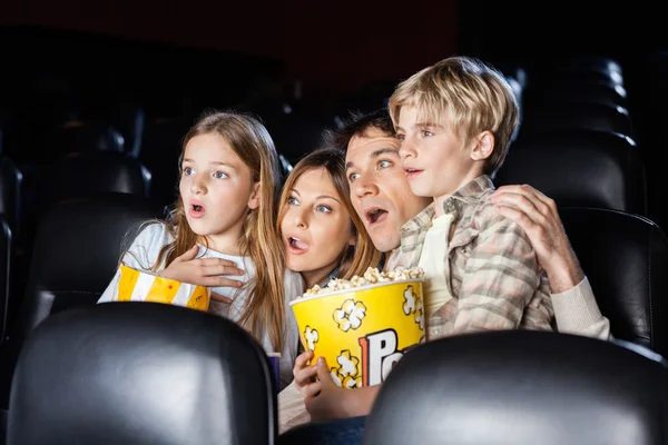 Shocked Family Watching Movie In Theater