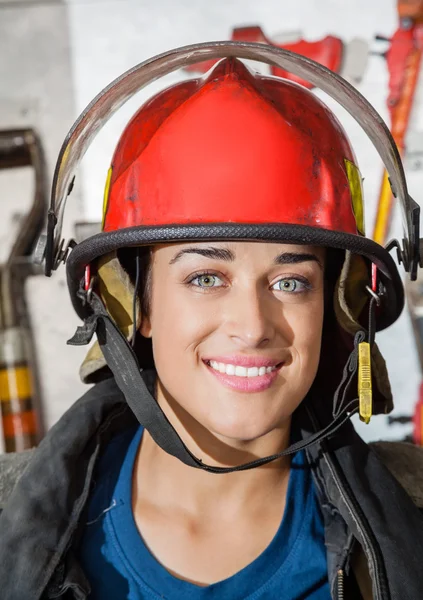 Happy Firewoman At Fire Station