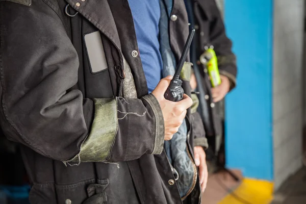 Fireman Holding Walkie Talkie