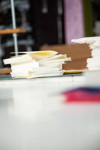 Notebook Papers On Table In Factory