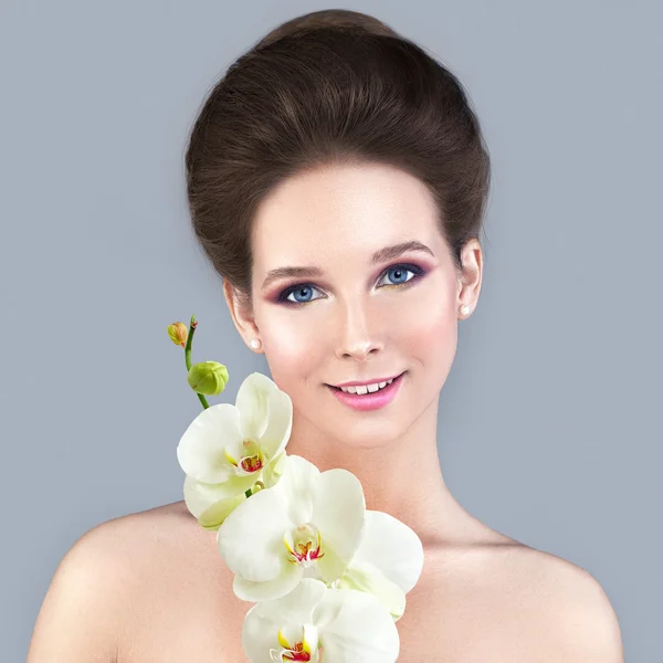 Spa Skin Care Concept. Healthy Woman with Clear Skin and White O