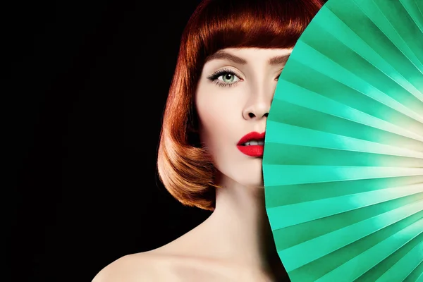 Redhead Woman. Red Coloring Hair, Red Lips and Green Paper Backg