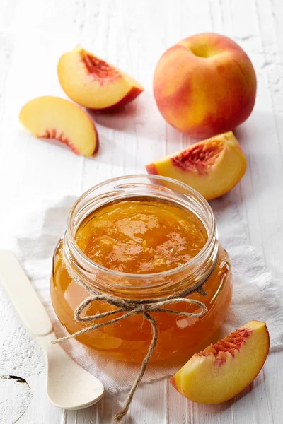 Jar of peach jam