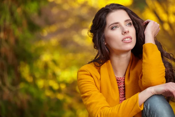 Young woman in autumn styling