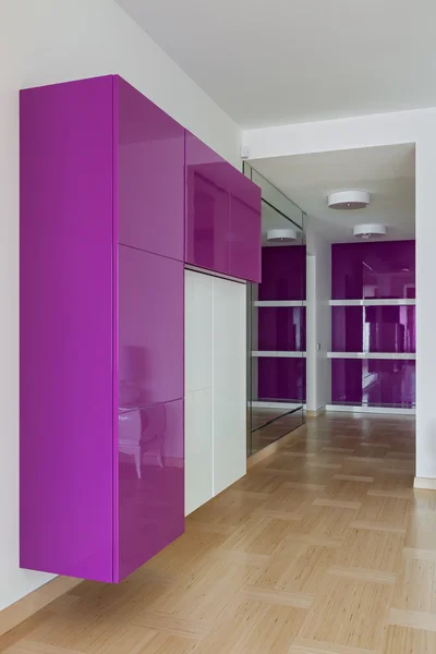 Interior of empty wardrobe room in pink colors