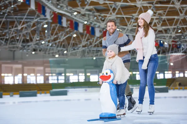 Family at ice-skating rink