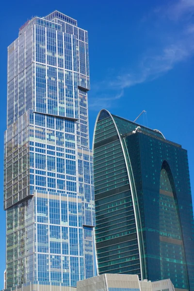 Edge of office building on sky background