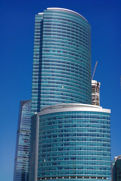 Edge of office building on sky background