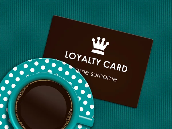 Coffee with loyalty card lying on tablecloth
