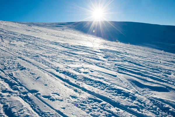 Bright sun in winter mountains