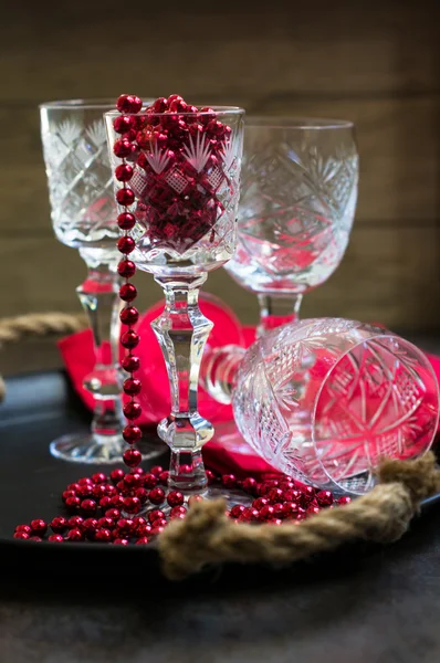 Old crystal glasses and christmas time decoration