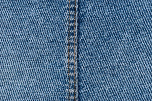 Denim jeans texture or denim jeans background with seam of fashi