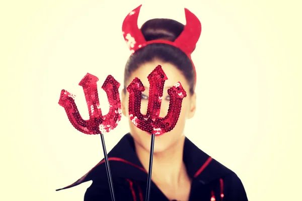Woman in devil carnival costume.
