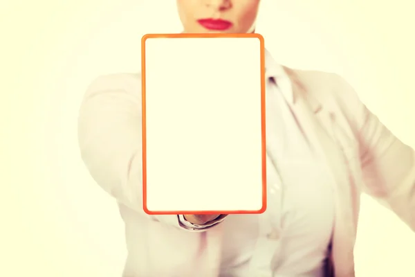 Young business woman holding a board with ban