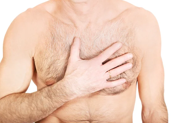 Mature shirtless man with chest pain