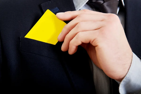 Businessman taking his personal card from pocket.