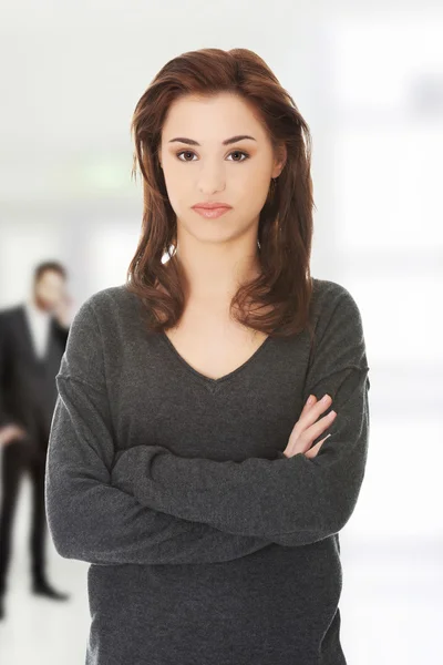 Woman with folded arms