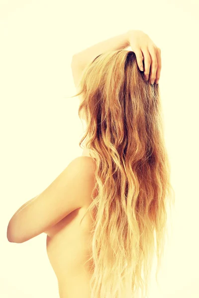 Woman with blonde long hair