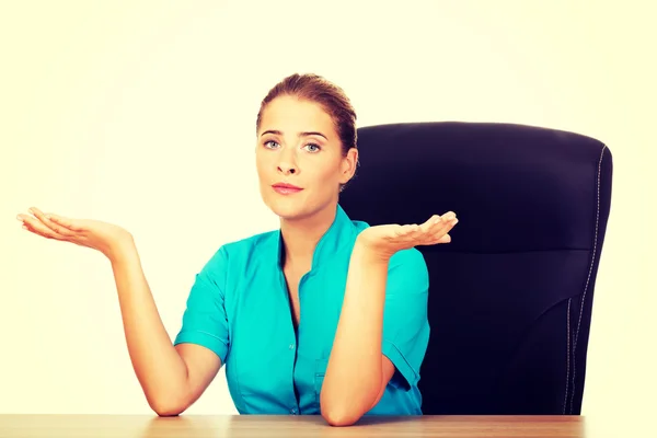 Female doctor talking with someone