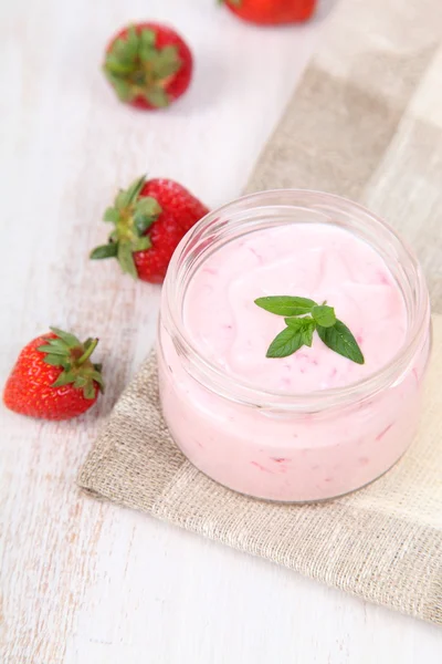 Strawberry yogurt and ripe strawberry
