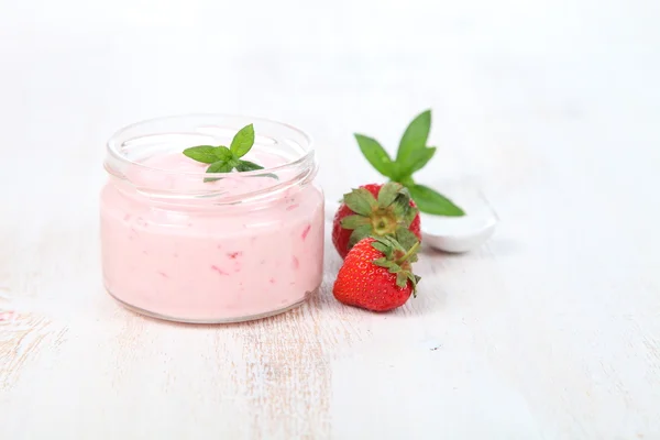 Strawberry yogurt and ripe strawberry